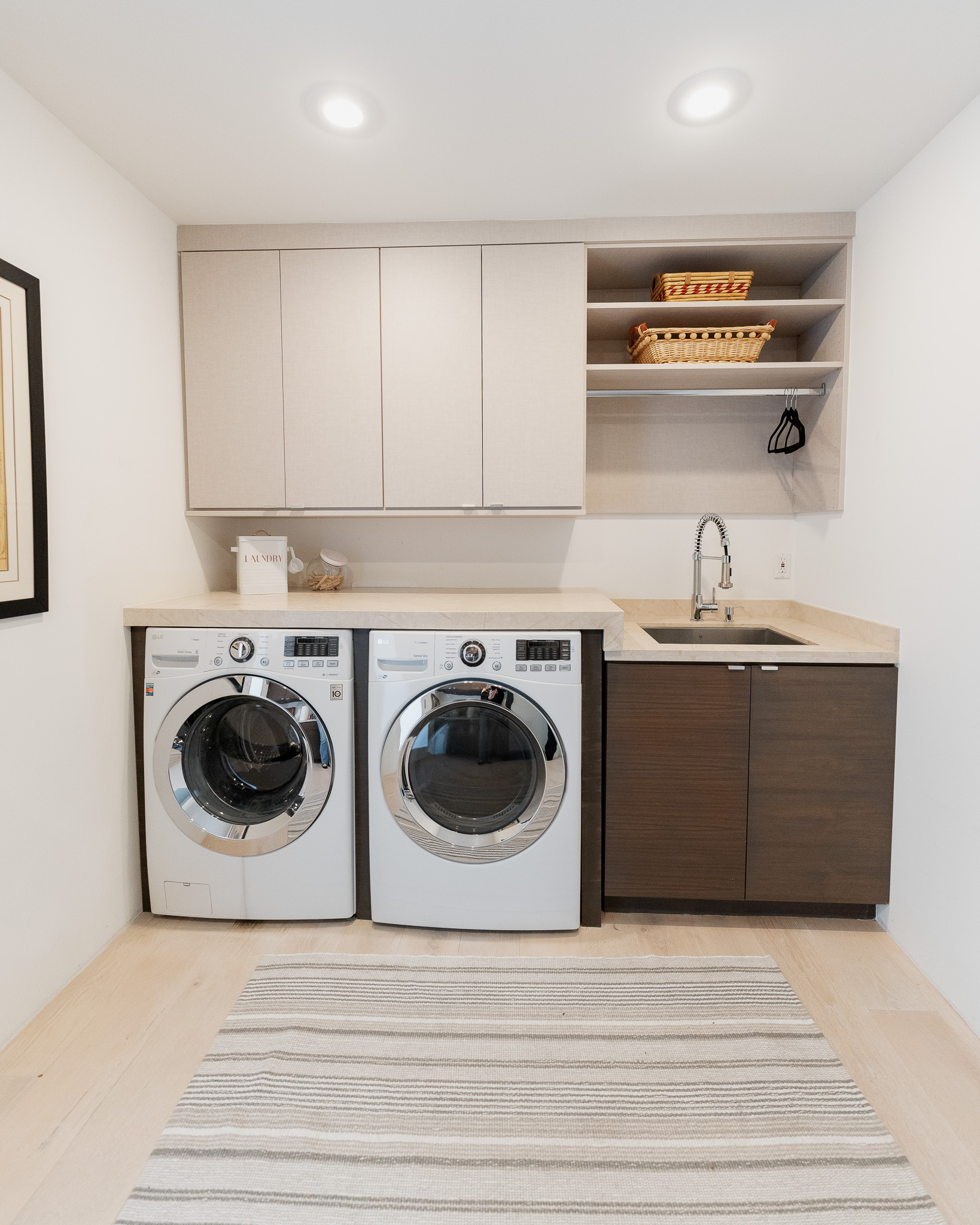 Laundry room with premium cabinetry and countertops