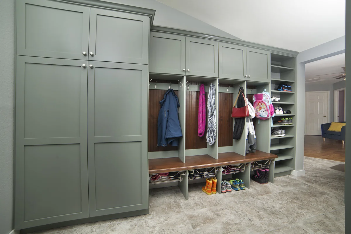 Green Milano mudroom with cubbies and shoe storage