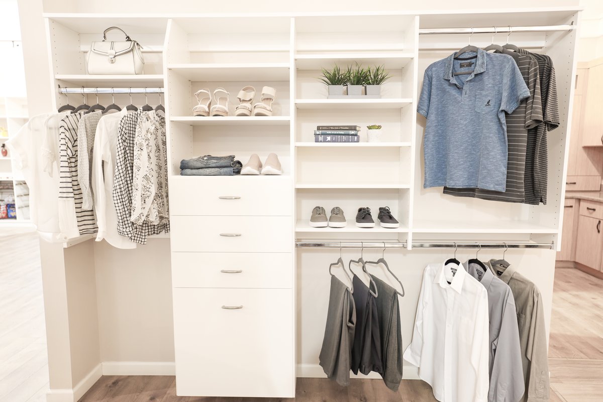 Full reach-in closet system with double-hang rods and cubbies